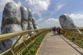 Da Nang, Vietnam - October 31, 2018: Tourists in Golden Bridge, a pedestrian footpath lifted by two giant hands, open in July 2018